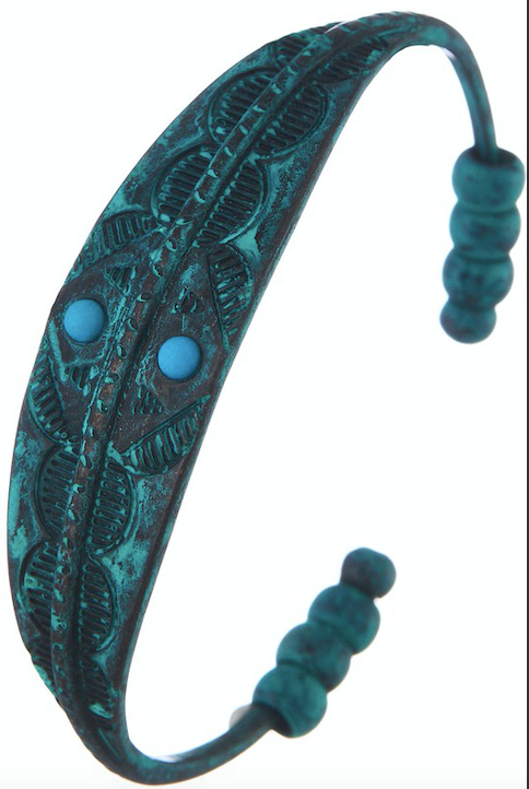 Stamped metal cuff bracelet with detailed turquoise beads.   Approx.  2.5".