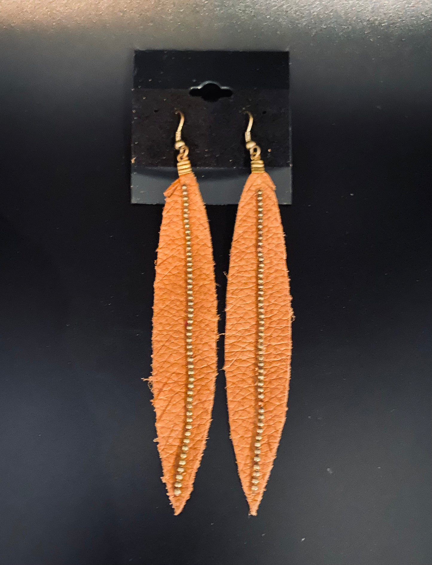 Brown leather feather earrings